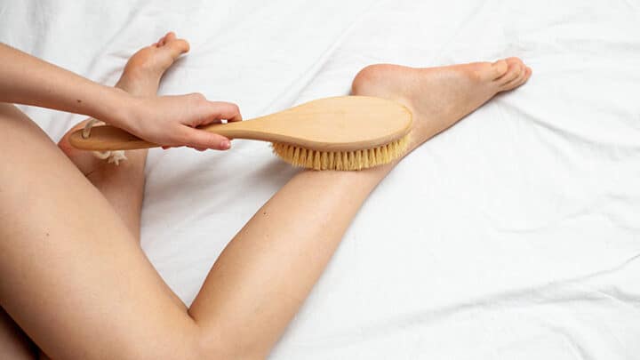 Girl doing dry heel massage.