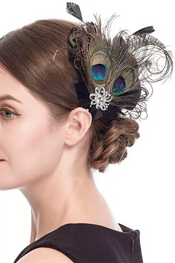Model wearing retro feathered hair clip.
