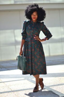 Funeka wearing collared dress and oxford shoes