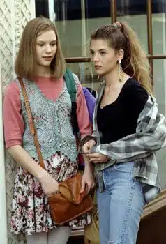 Two girls wearing plaid