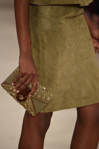 green suede skirt and matching hand bag