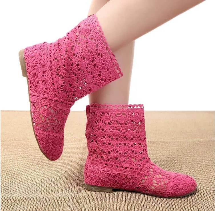 feet with pink crochet boots