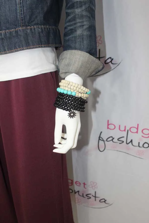 mannequin wearing beaded stacked bracelets
