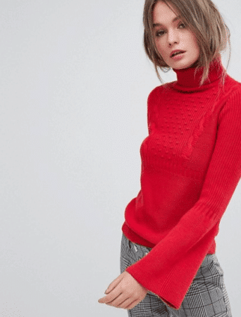 Red roll neck sweater with fluted sleeves