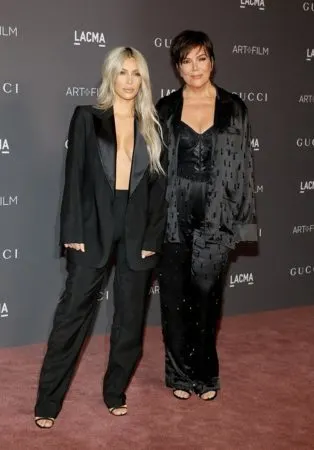 Kris Jenner and Kim Kardashian wearing all black