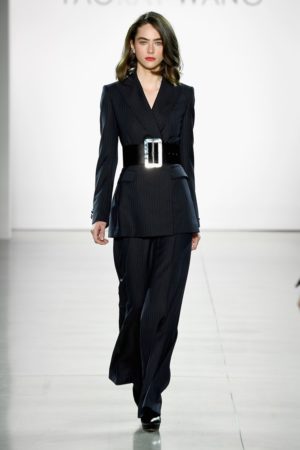 Dark suit with wide belt by Taoray Wang