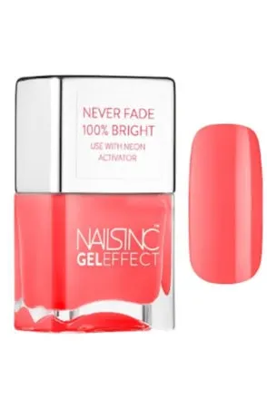 Neon coral nail polish