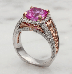 Custom ring with two-tone metal and a pink stone