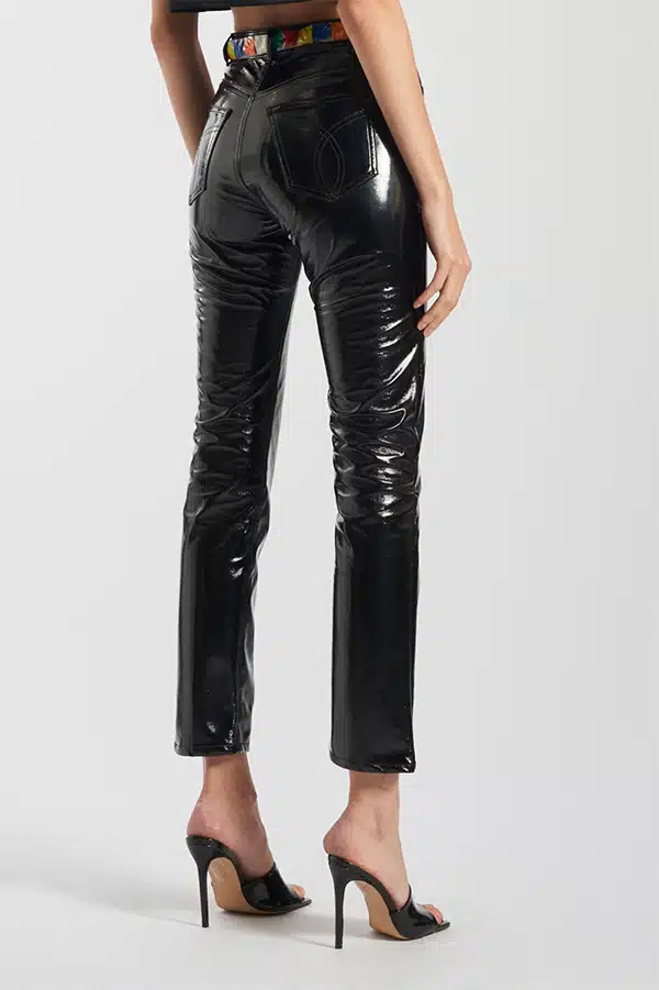 Product shot of model wearing very tight vinyl pants.