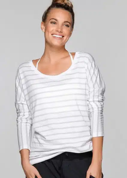 Woman wearing white striped long-sleeved t shirt
