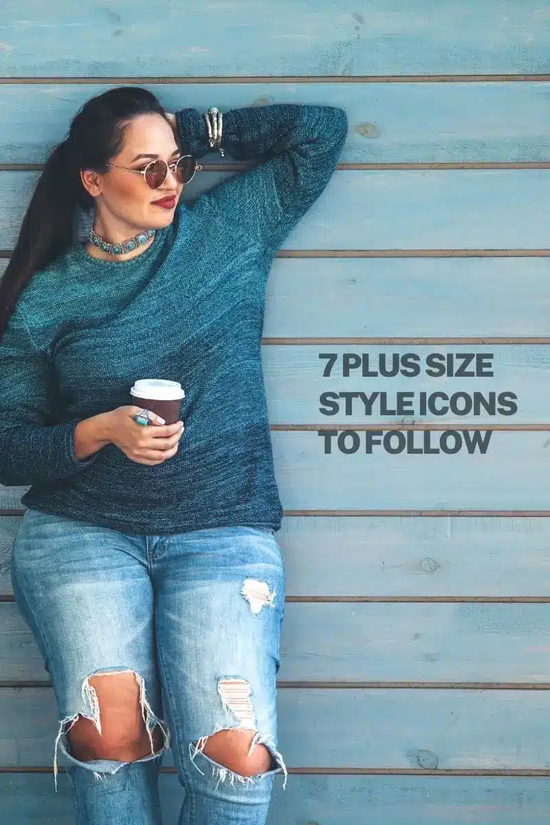 Plus-size model against planked wall.