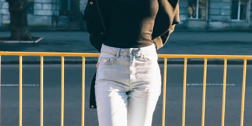Woman wearing high-waisted, baggy jeans