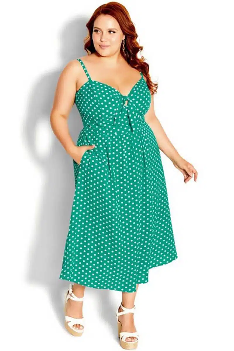 Model wears polka dot sundress from Target.