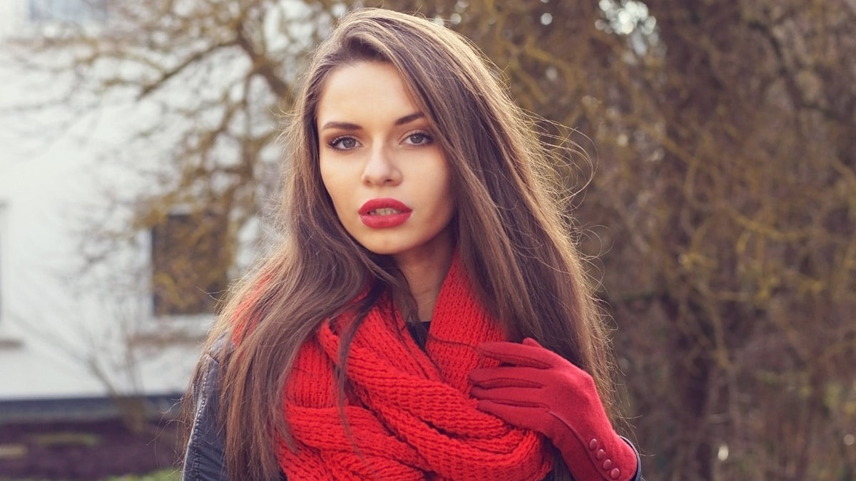 Woman wearing red winter scarf