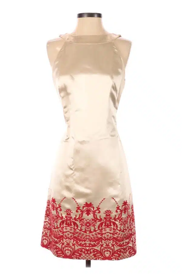 Ivory dress with red stitching