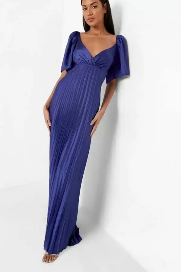 Model wears floor-length blue gown.