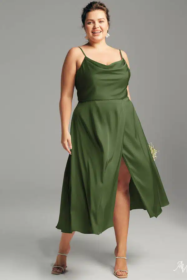 Model wears midi length strapless dress.