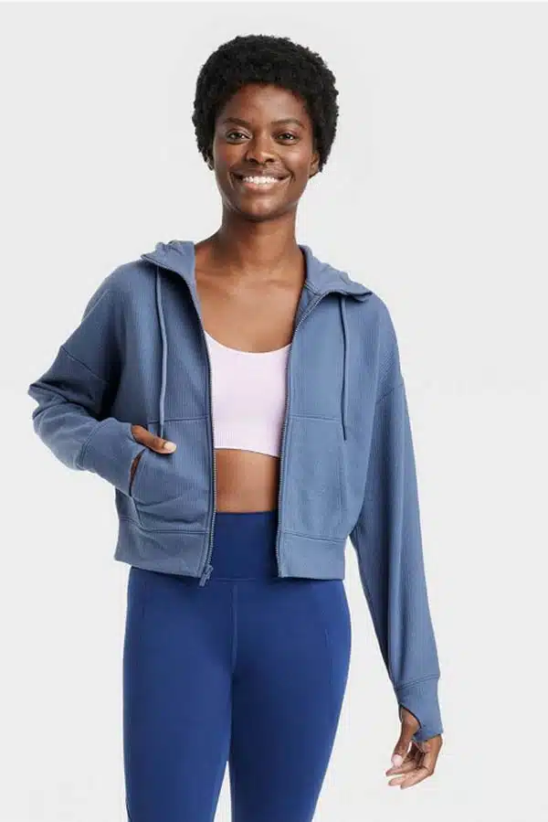 Model wears cute cropped sweatshirt from Target.