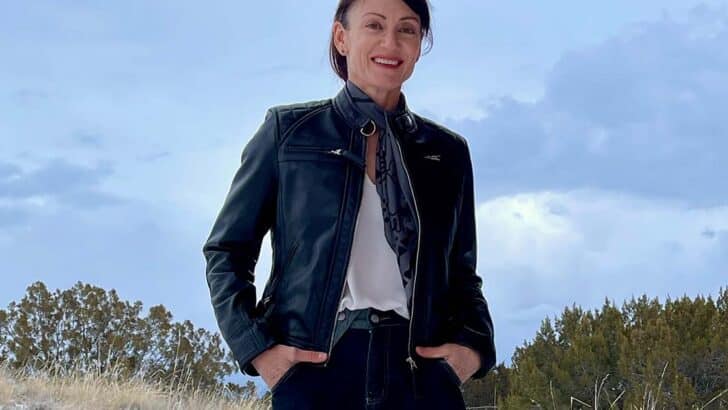 Catherine Brock wearing leather moto jacket from FanJackets.