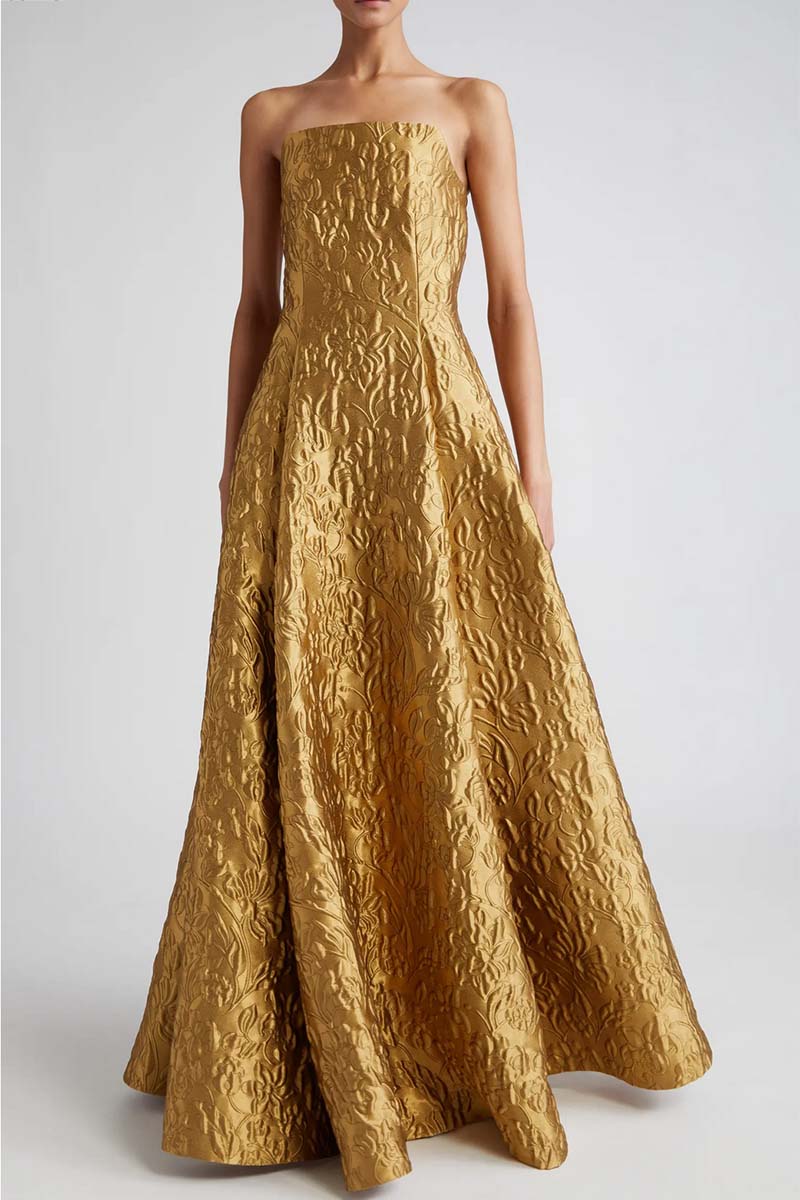 Model wears Emilia Hickstead gold ballroom gown. 
