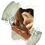 Close-up of woman applying hair product to hair with text overlay about Davines brand.