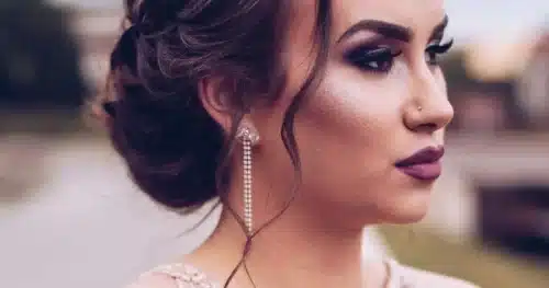 Girl with heavy makeup and formal dress.